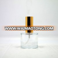 50ml round clear glass perfume bottle with gold sprayer pump